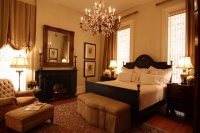 Grand Guest Bedroom with Painted Iron Bed and Silk Drapery - traditional - bedroom - new orleans