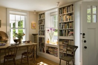 Bookcases flanking window - traditional - living room - burlington