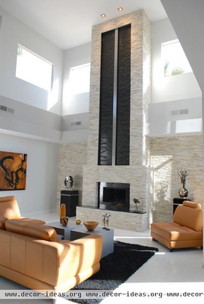 Extended Fireplace Waterfall - modern - living room - las vegas