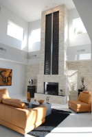 Extended Fireplace Waterfall - modern - living room - las vegas