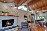 Fireplace in Great Room with wood paneled ceiling - traditional - living room - vancouver