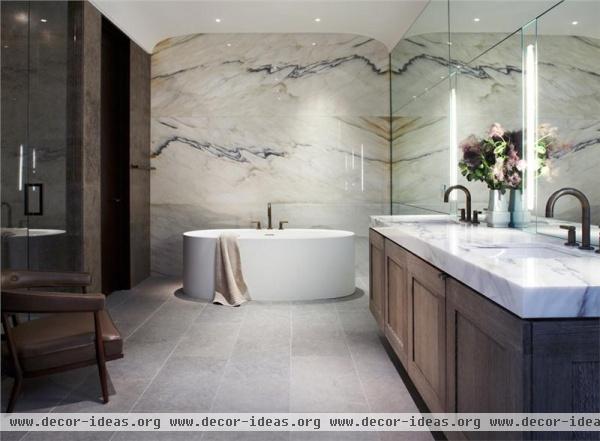 Light Transitional Bathroom by Laura Kirar