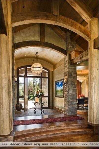 Dramatic Country/Rustic Foyer by Lynette Zambon & Carol Merica