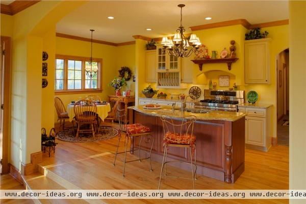 Open Traditional Kitchen by Amy  Conner-Murphy