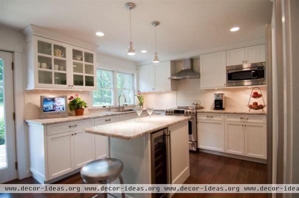 Open Transitional Kitchen by Carol DeBear