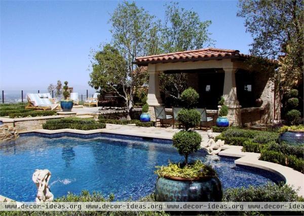 Dramatic Contemporary Outdoor Kitchen by Drew Sivgals