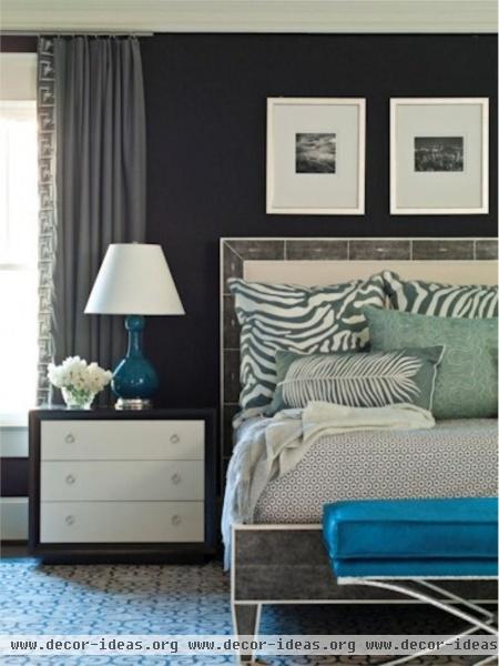 Dramatic Transitional Bedroom by Brian Watford