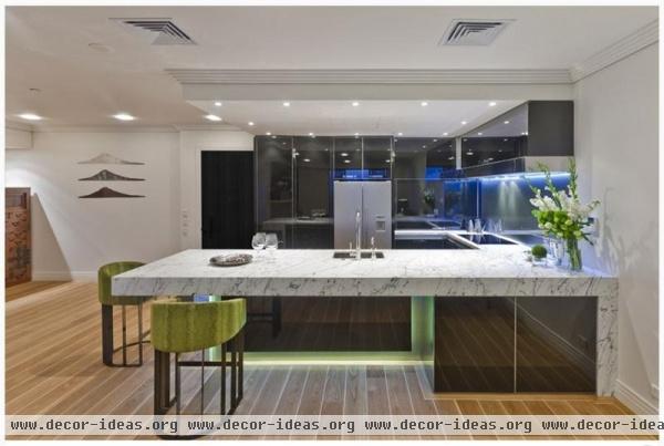 Dramatic Contemporary Kitchen by Mal Corboy