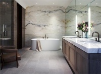 Light Transitional Bathroom by Laura Kirar