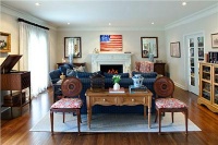 Open Traditional Living Room by Lauren Jacobsen