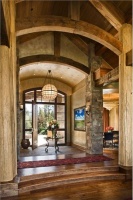 Dramatic Country/Rustic Foyer by Lynette Zambon & Carol Merica