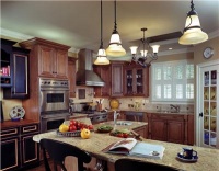 Cozy Traditional Kitchen by Amy  Conner-Murphy