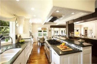 Open Transitional Kitchen by Sarah Barnard