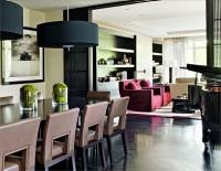 Open Transitional Dining Room by Kelly Hoppen