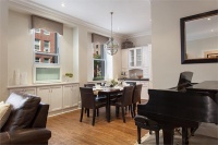 Cozy Contemporary Dining Room by Scott Hirshson