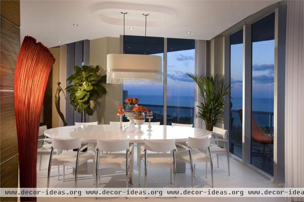 Elegant Contemporary Dining Room by JAY BRITTO