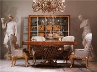 Dramatic Traditional Dining Room by Olga Rechdouni