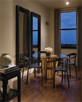 Dark Contemporary Dining Room by Gary Lee