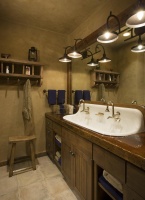 Dark Country/Rustic Bathroom by Jerry Locati