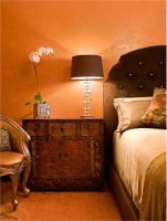 Dramatic Transitional Bedroom by Deb Reinhart, ASID