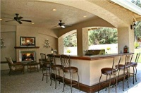 Cozy Traditional Outdoor Kitchen by John  Caulfield