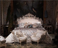 Dramatic Traditional Bedroom by Olga Rechdouni