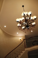 Grapvine and Berry Garland in the Foyer Chandelier - traditional - entry - seattle