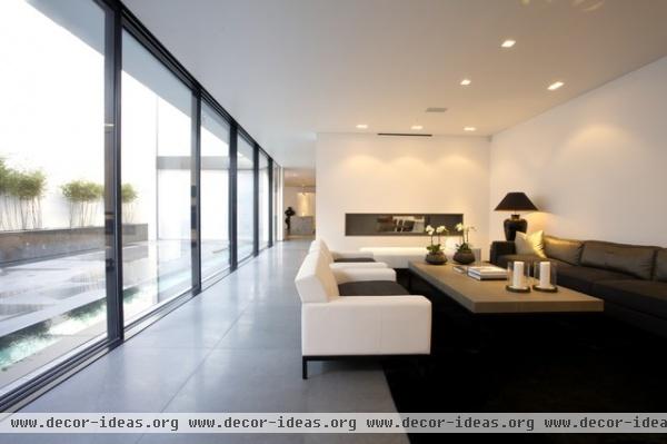 Living Room with Lutron Homeworks lighting control - modern - living room - london