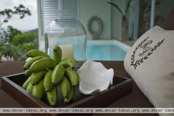 tropical bathroom by Decori Designs