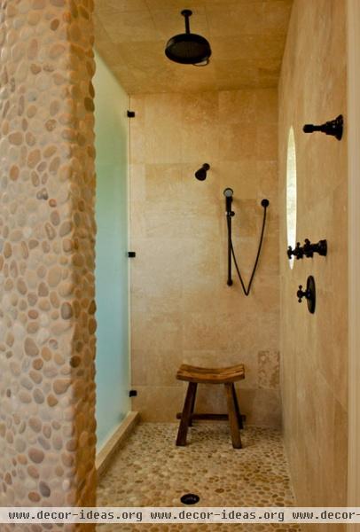 Pebble texture and stone Master Shower - tropical - bathroom - charleston