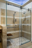 Kinetik rolling door shower enclosure w/ Moen 'Vertical Spa' - asian - bathroom - philadelphia