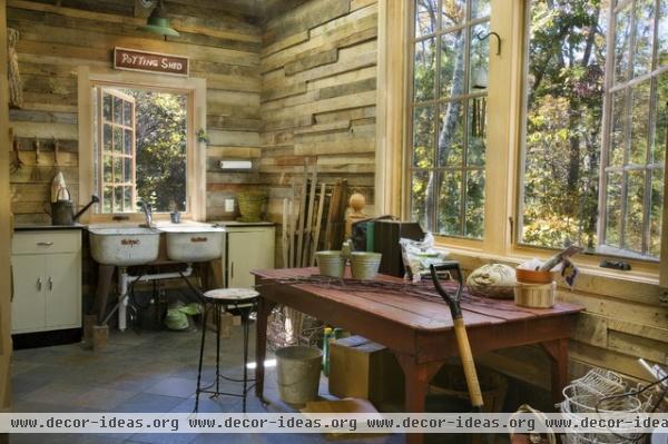 eclectic garage and shed by Norris Architecture