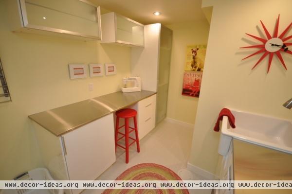 modern laundry room by The Design Den Homes Inc.