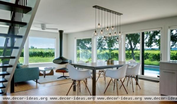 modern dining room by Andrew Snow Photography