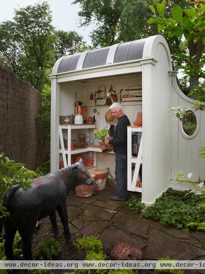 traditional garage and shed by Art | Harrison Interiors & Collection