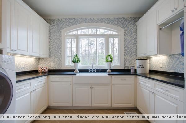 traditional laundry room by Abbey Construction Company, Inc.