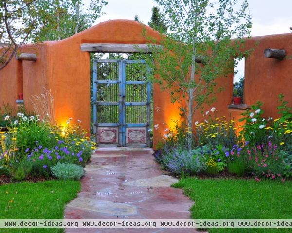 mediterranean landscape by Designscapes Colorado Inc.