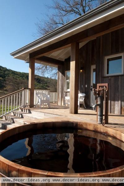 farmhouse porch by CahillStudio Sonoma