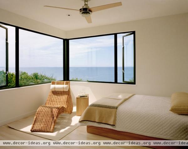 beach style bedroom by Robert Young Architects