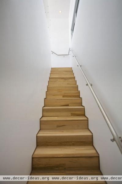 modern staircase by Baldridge Architects