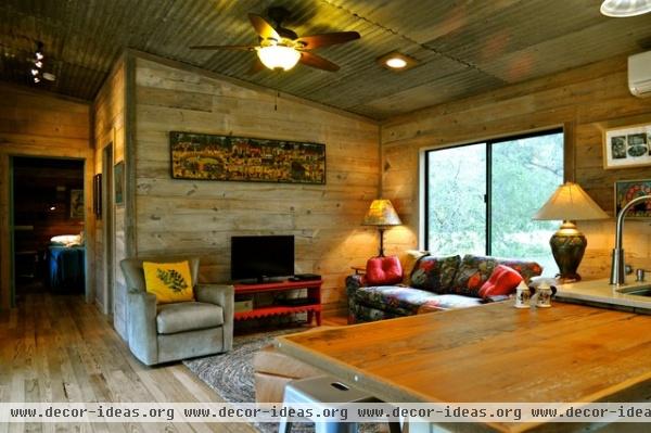 rustic family room by Reclaimed Space