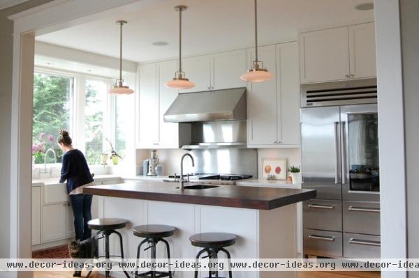 traditional kitchen by Group3 Architects llc