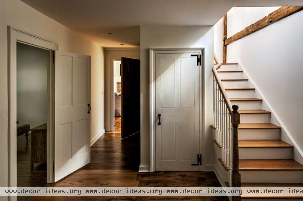 farmhouse staircase by Crisp Architects