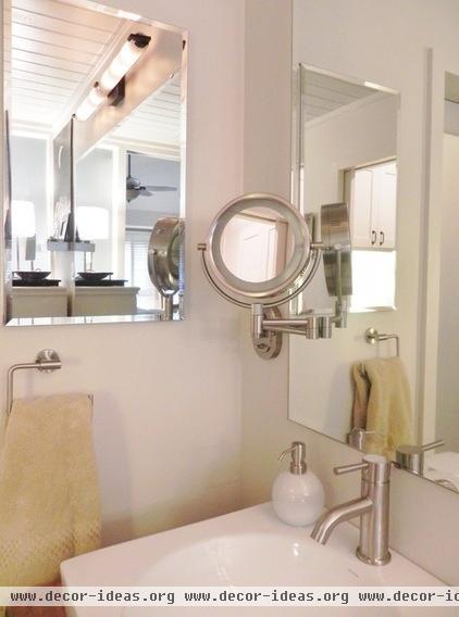 modern bathroom square vessel sink; wall mounted mirror; medicine cabinet; windowless bath