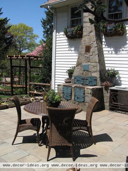 rustic patio by Susan Cohan, APLD