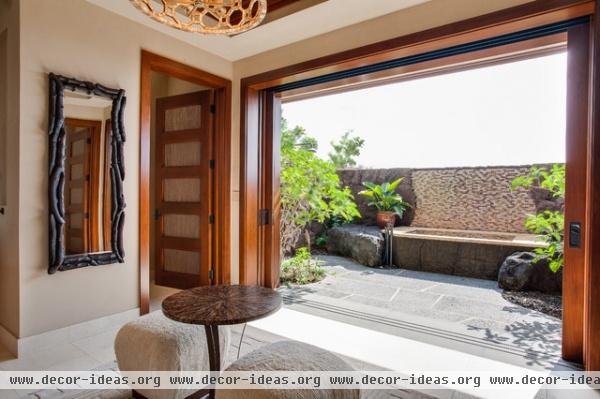 tropical bathroom by Norelco Cabinets Ltd