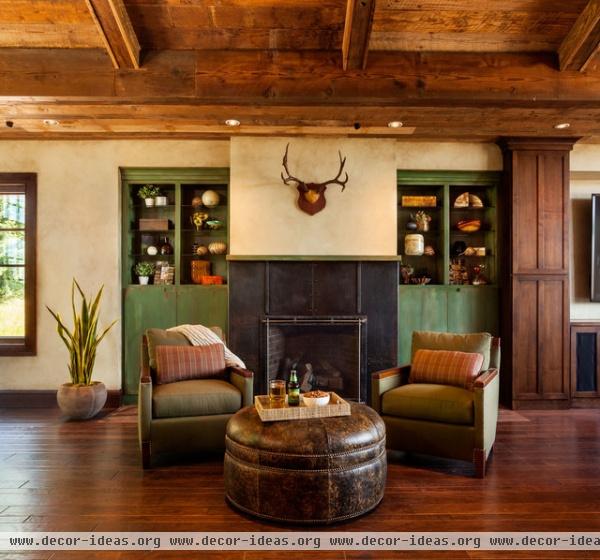 rustic family room by Master Woodworks inc