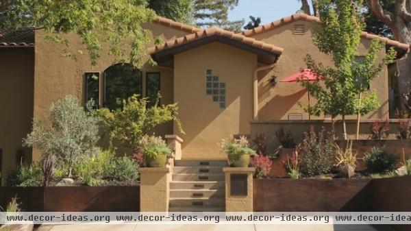 mediterranean exterior See a Steep Landscape Transformed to a Terraced Entry