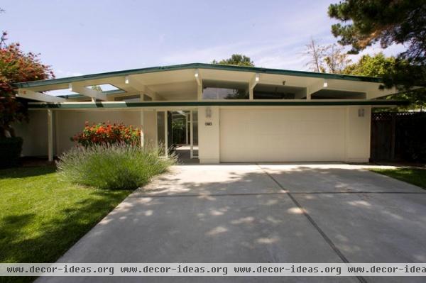 midcentury exterior by Keycon, Inc