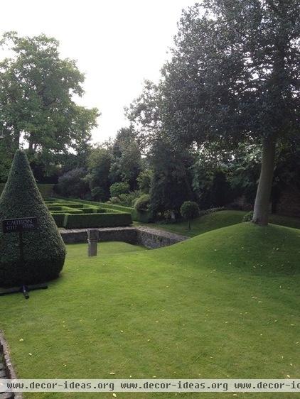 Restoration House, Rochester, England Top lawn with tree mound